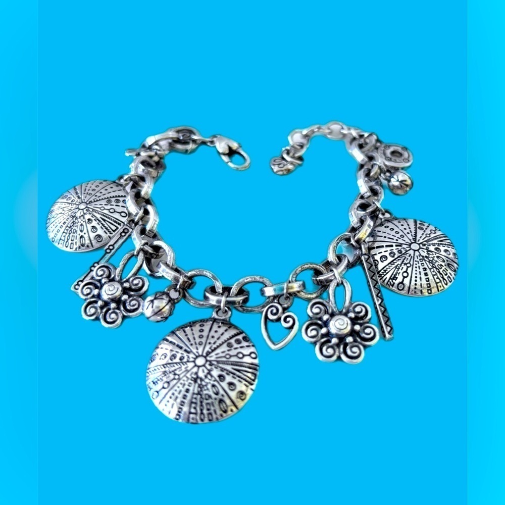 Brighton LA PAZ Bracelet NWOT . Silver Plated Dangle Charms. Very unique.